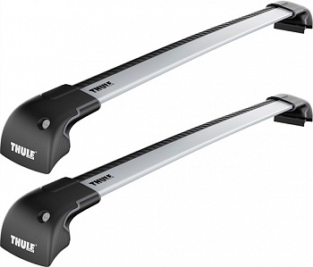 Комплект багажника Thule WingBar Edge для а/м со штатными местами Комплект багажника Thule WingBar Edge для а/м со штатными местамиБагажники<br>Низкая посадка и близость к крыше автомобиля создают привлекательный вид. Слегка выгнута для удобной подгонки. Удобный в применении инструмент с индикацией крутящего момента для безопасного закрепления. Подходит ко всем автомобилям благодаря телескопическим опорам выдвигаются на 50 мм с каждой стороны. Предварительно собранные и полностью укомплектованные элементы облегчают использование. С применением авиа технологии для минимизации шума и потребления топлива. WindDiffuser™ перенаправляет воздушные потоки. TrailEdge™ для снижения сопротивления воздуха. Изделие успешно прошло испытание City Crash до 75 кг согласно нормативам ISO.<br>